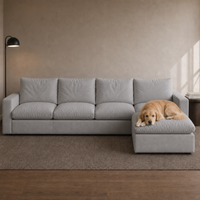 4 Seat SkyLux Drift Cloud Couch in Light Grey — four seats with ottoman chaise, golden retriever lying on the ottoman