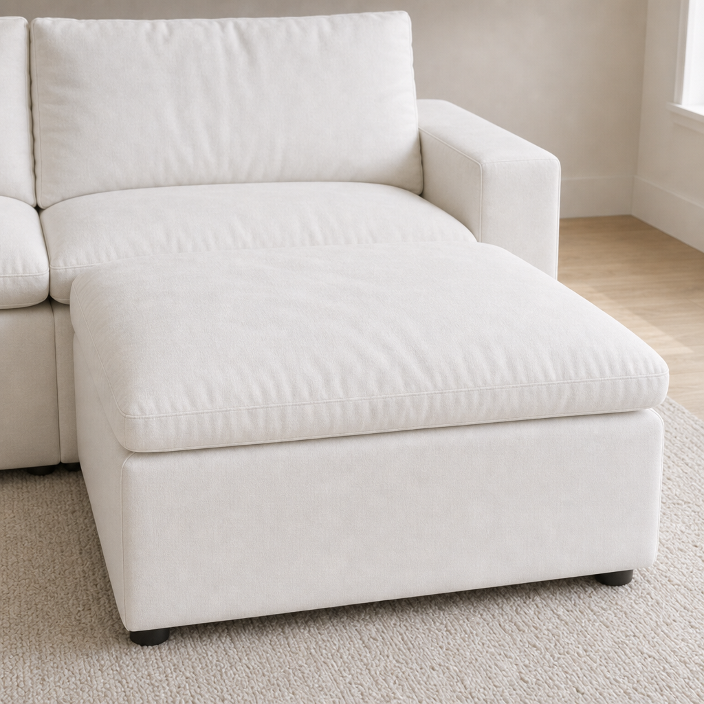 SkyLux Storage Ottoman in White — connected flush to a Cloud Couch seat forming a chaise, close-up